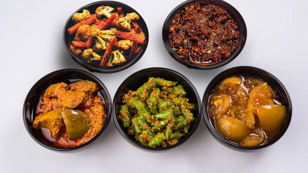 6740b1056eea89ab2d5ce58a_Tangy Spicy Sweet The Diverse World of Indian Achar Blog Cover